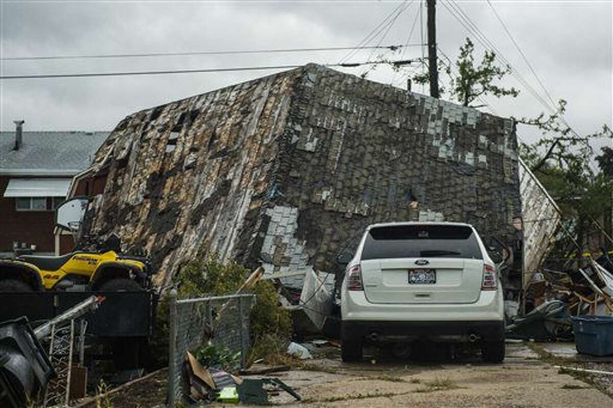 A structure is damaged caused from a tornado in Washington Terrace City, Utah, Thursday, Sept. 22, 2016. Other storms in the area that produced winds in excess of 70 mph caused damage to trees and other property near the city of Layton. That's about 15 miles south of Washington Terrace. (Chris Detrick/The Salt Lake Tribune via AP)