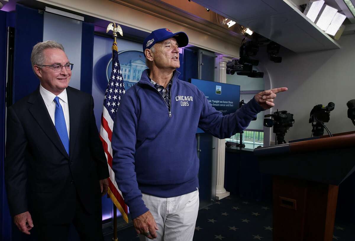 Comedian Bill Murray (R) gestures as he visits the James Brady Press Briefing Room at the White House October 21, 2016 in Washington, DC. Murray is in Washington to receive the 2016 Mark Twain Prize for American Humor at the Kennedy Center on Sunday. (Photo by Alex Wong/Getty Images)