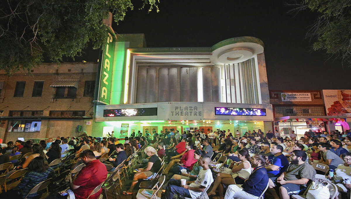 Laredoans attend the New Urbanism Film Festival outside the historic Plaza Theater on Thursday evening.