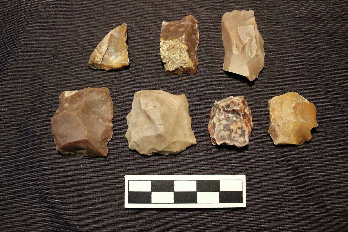 These are believed to be gunflints, found in City Cemetery No. 2 on the East Side. Archaeo- logists believe they may have been used by Mexican forces, including those involved in the 1836 siege at the Alamo, to fire their muskets.