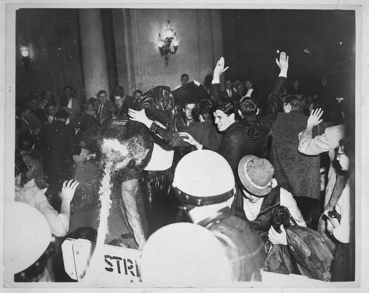 Friday May 13, 1960: Protest and sit-in against House Un-American Activities Committee (HUAC) at City Hall, San Francisco. Police evict protestors using a fire hose, washing them down the steps. Chronicle photographers Bob Campbell and Peter Breinig