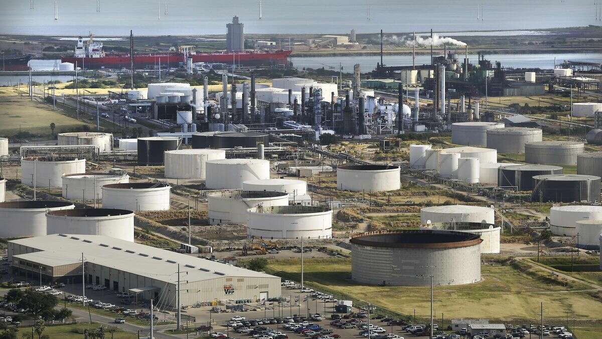 This Oct. 28, 2013, ariel photo shows Valero offices, left, and Citco storage containers right, in Corpus Christi, Texas. (AP Photo/The San Antonio Express-News, Bob Owen)