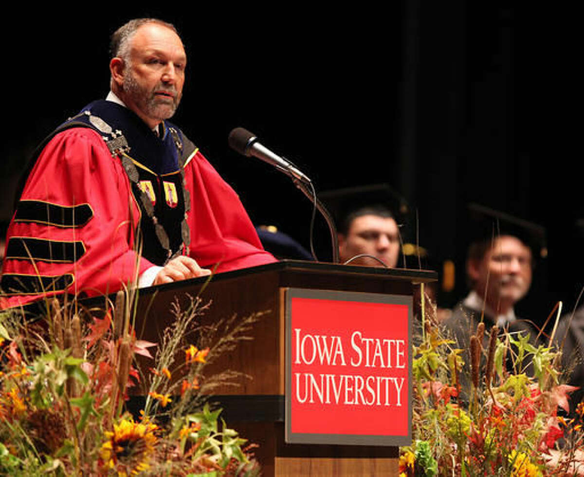 FILE - In this Sept. 14, 2012 file photo, Iowa State President Steven Leath speaks he is officially installed as the university's 15th president during a ceremony in Ames, Iowa. Leath caused "substantial damage" to a university airplane he was piloting when it made a hard landing at an Illinois airport last year - a costly incident kept quiet for 14 months. Reports obtained by The Associated Press show both wings suffered damage after Leath failed to navigate windy conditions and hit the runway at the Central Illinois Regional Airport in Bloomington, Ill. The university confirmed the incident Friday, Sept. 23, 2016, after AP inquiries, saying it paid for $12,000 in repairs itself rather than file an insurance claim. (Bryon Houlgrave/The Des Moines Register via AP, File)
