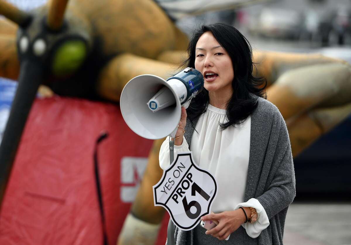 IMAGE DISTRIBUTED FOR AIDS HEALTHCARE FOUNDATION - San Francisco County Supervisor Jane Kim addresses a crowd during a "Yes on Prop 61" rally outside City Hall in San Francisco on Tuesday, October 11, 2016. San Francisco elected officials, veterans, nurses and volunteers spoke during the event to slam big pharma and their ever increasing costs for drugs. (Josh Edelson/AP Images for AIDS Healthcare Foundation)