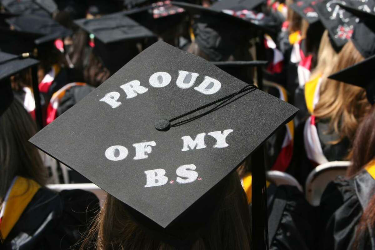 A graduate wears a decorated mortar board at Sacred Heart University's Commencement ceremony on Sunday.