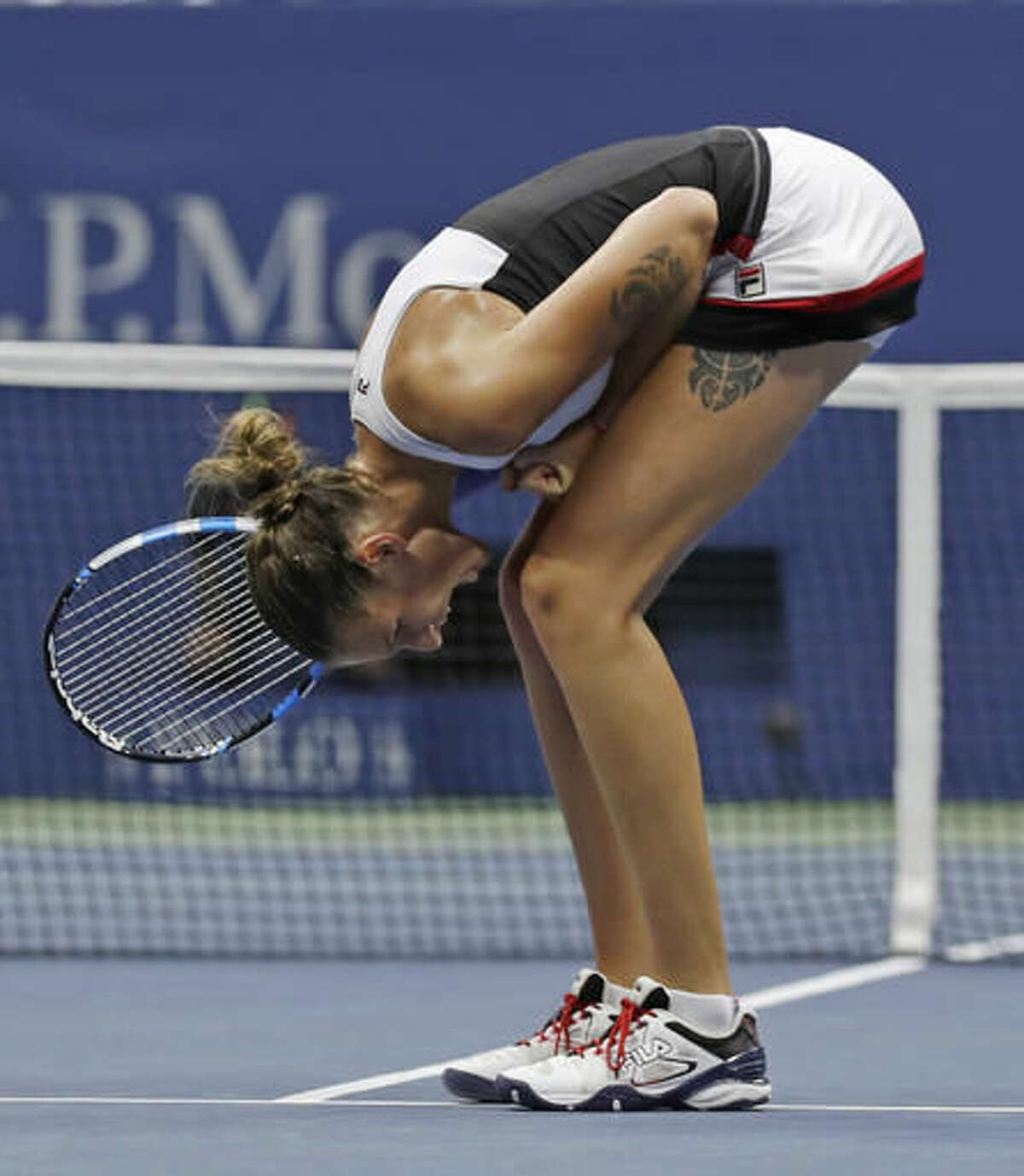 Karolina Pliskova, of the Czech Republic, reacts after a point against Angelique Kerber, of Germany, during the women's singles final of the U.S. Open tennis tournament, Saturday, Sept. 10, 2016, in New York. (AP Photo/Charles Krupa)