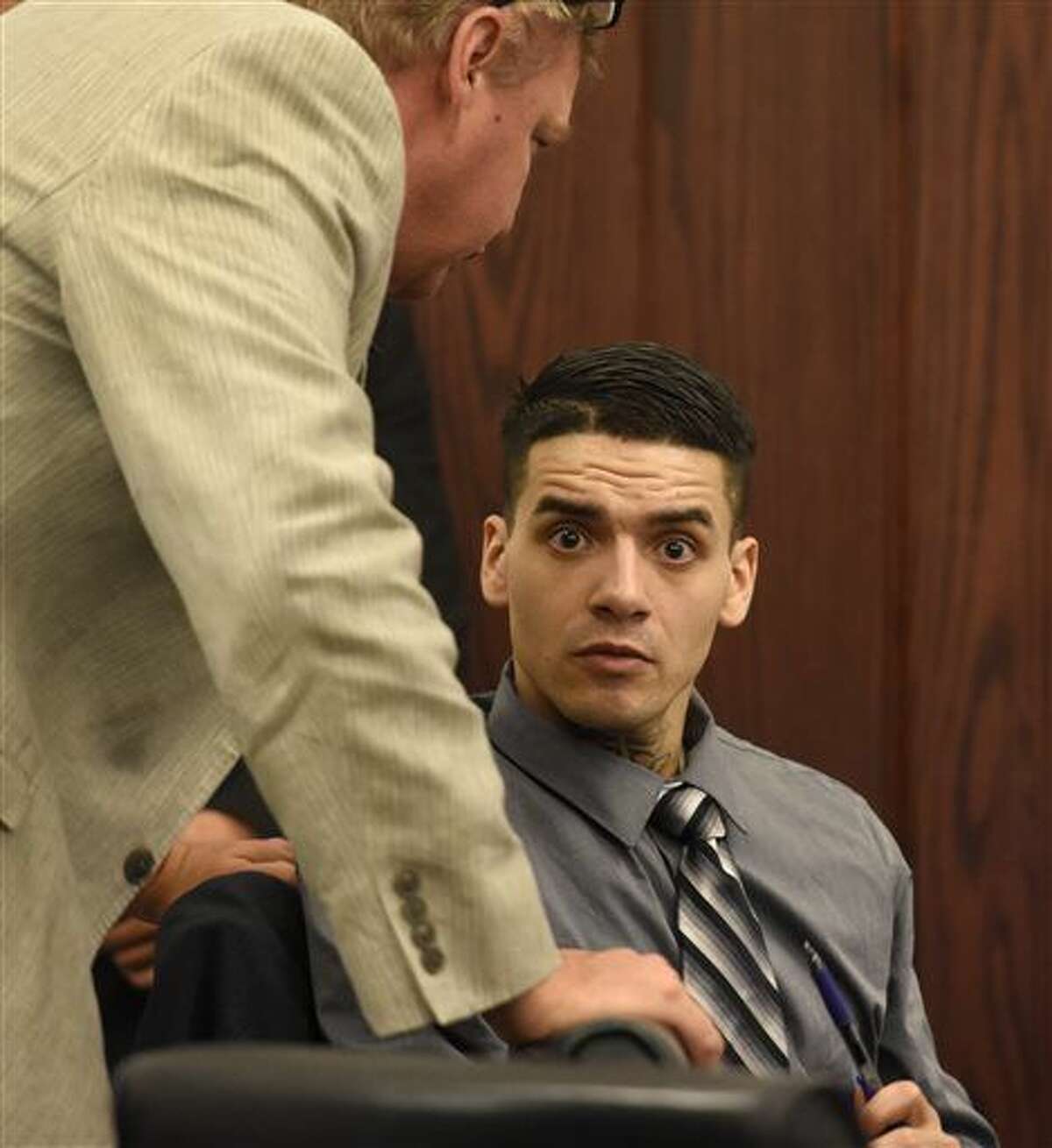 Suspect Andrew Romero appears during the first day of testimony in his trial in Los Lunas, N.M., Thursday, Sept. 8, 2016. Romero is on trial for the shooting death of Rio Rancho Officer Gregg "Nigel" Benner, who shot and killed after making a traffic stop in an Albuquerque suburb. (Dean Hanson/The Albuquerque Journal via AP)