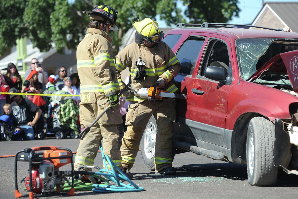 Public safety officers and Midland Fire Department personnel put on a demonstration of vehicle extrication techniques during the third annual "Truck or Treat" open house and Halloween carnival on Saturday, Oct. 22, 2016, at the Central Fire Station. James Durbin/Reporter-Telegram