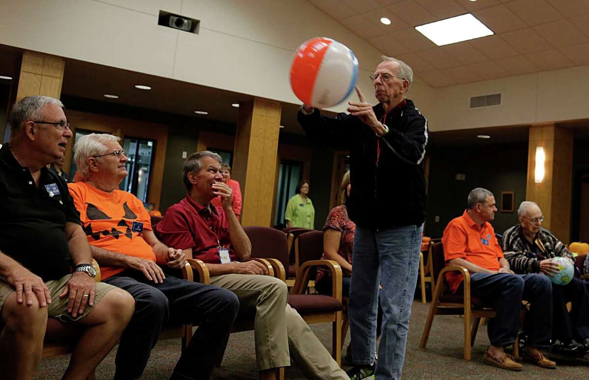 Walter Blake tosses a beach ball at the Interfaith Care Partners outreach session for Alzheimer's and other disabled people during an entertaining day of arts/crafts activities at Lakewood United Methodist Church Oct. 10, 2016, in Spring. ( James Nielsen / Houston Chronicle )