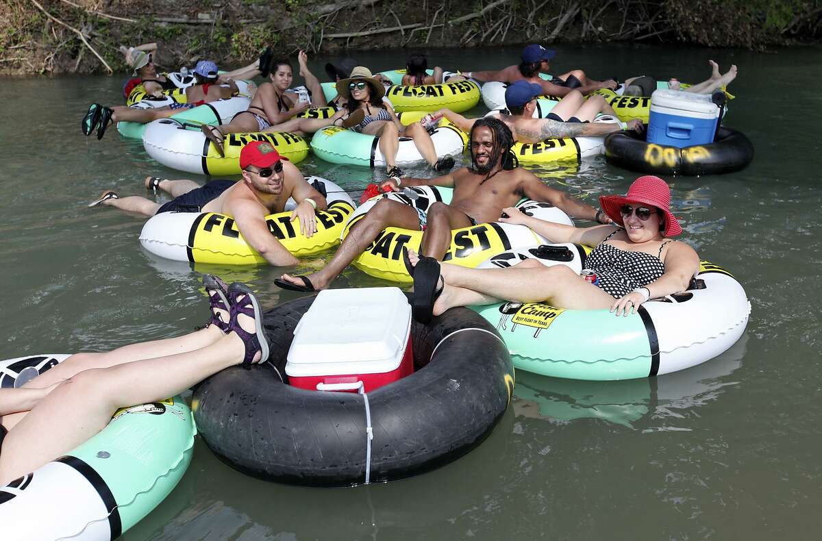 Tubers float the San Marcos River while attending Float Fest held at Cool River Ranch Sunday Aug. 30, 2015 in Martindale, Tx.