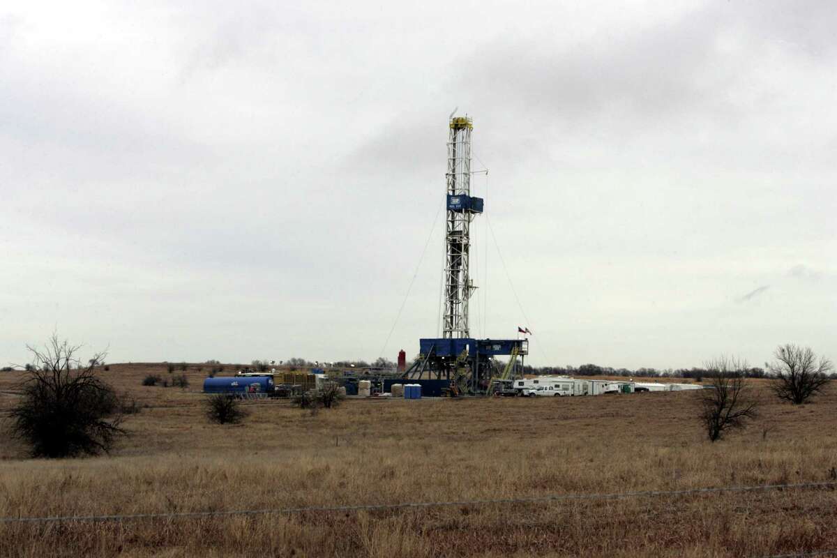 A natural gas drilling site west of Ponder, Texas is shown surrounded by grassy scrubland, Friday, Jan. 3, 2006. The rig is located on the 5,000-square-mile Barnett Shale reservoir. (AP Photo/Donna McWilliam)