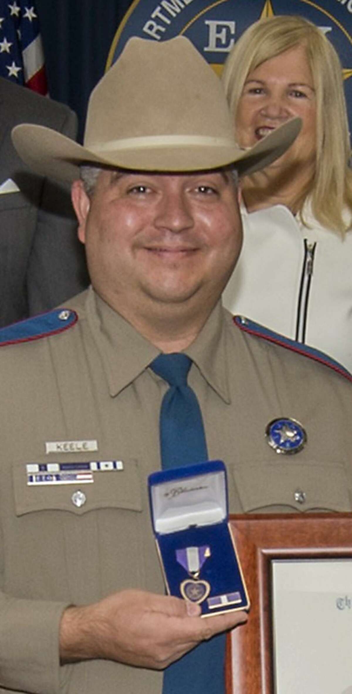 Trooper Timothy Keele received two awards for the injury he suffered during the shooting of Garrett McKinney.