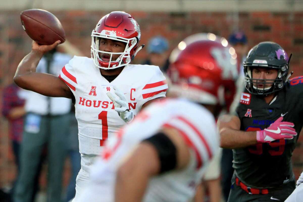 DALLAS, TX - OCTOBER 22: Greg Ward Jr. #1 of the Houston Cougars looks for an open receiver against the Southern Methodist Mustangs in the second quarter at Gerald J. Ford Stadium on October 22, 2016 in Dallas, Texas.