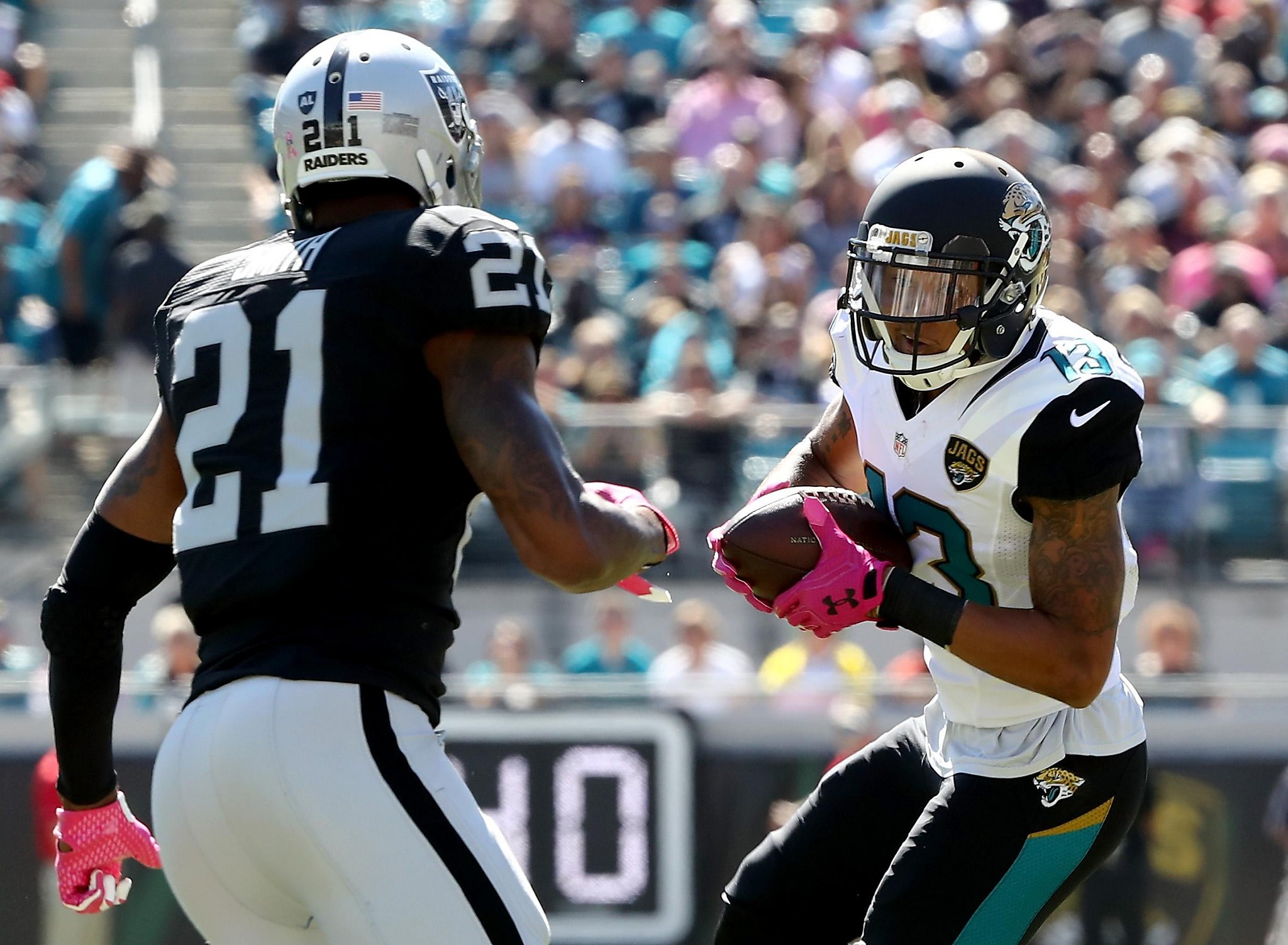 Oakland Raiders corner back DJ Hayden breaks up a pass intended for News  Photo - Getty Images