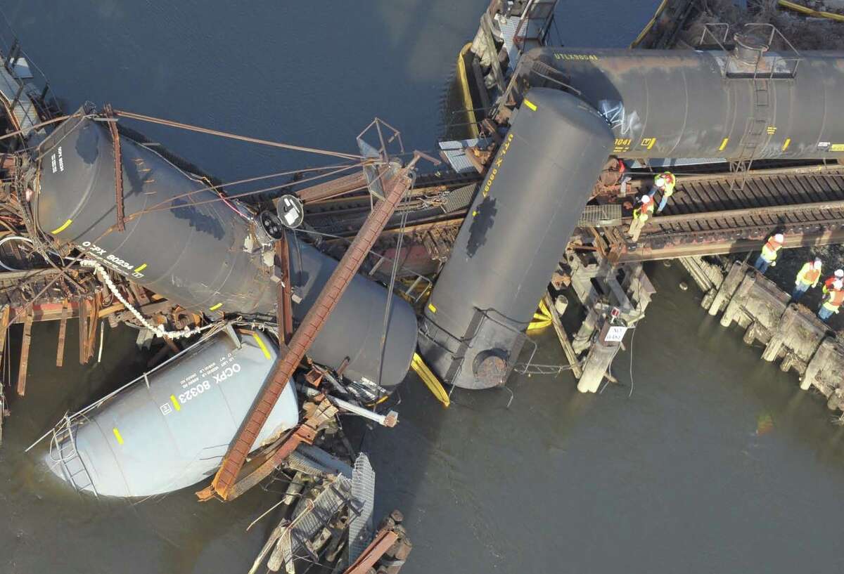 A train derailed in Paulsboro, N.J., releasing about 25,000 pounds of toxic vinyl chloride. The National Transportation Safety Board heavily criticized the emergency response for putting responders and the public in danger. Dozens went to hospitals.