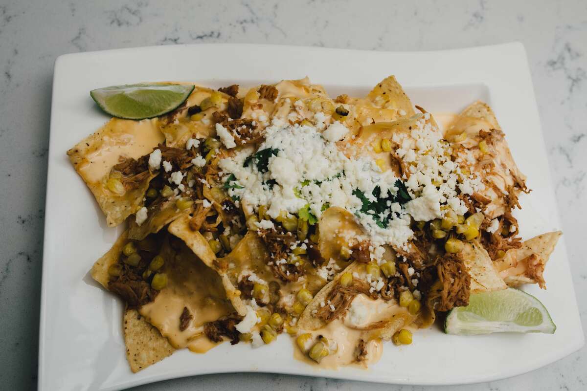Street Corn Chicken Nachos: $12Where you can find it: SA GRILLE "Pulled ancho-spiced chicken, Chihuahua cheese sauce, grilled corn, queso fresco and crema."