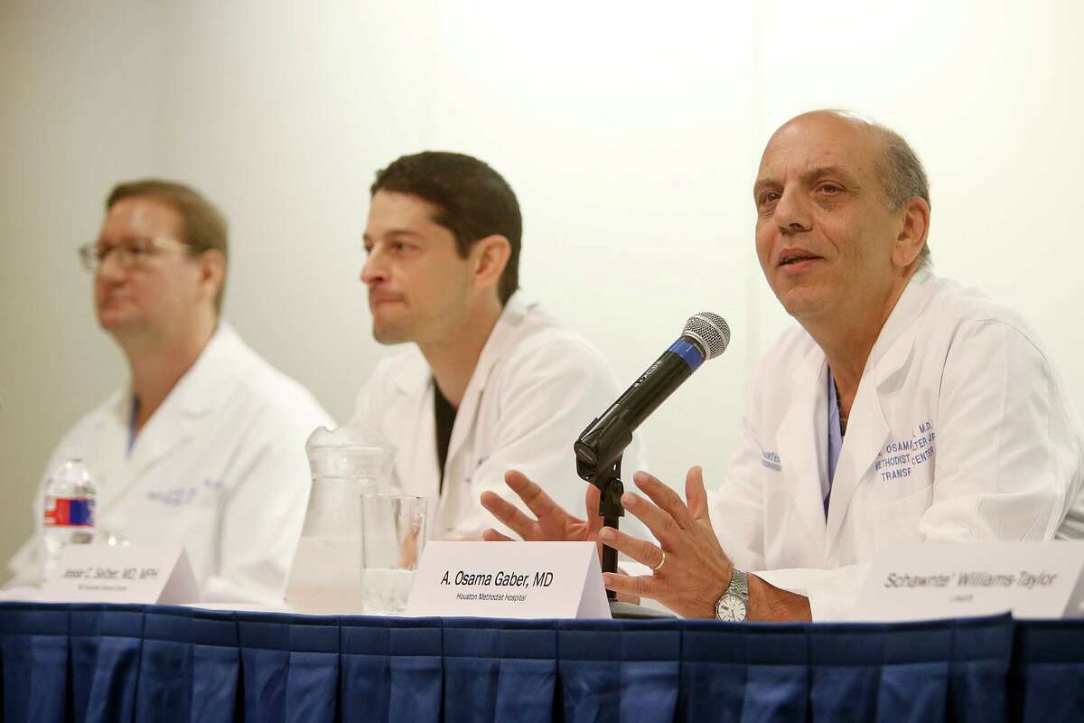 (Left to right) Michael Kiebuc, MD, of Houston Methodist Hospital, Jesse C. Selber, MD, MPH, of MD Anderson Cancer Center, and A. Osama Gaber, MD, of Houston Methodis Hospital, describe the transplant surgery during a press conference at Houston Methodist Hospital on Thursday, June 4, 2015, in Houston. Boysen will be released today after surgeons from Houston Methodist Hospital and MD Anderson Cancer Center performed the world's first skull and scalp transplant on May 22. Boysen photographed at Houston Methodist Hospital. ( Mayra Beltran / Houston Chronicle )
