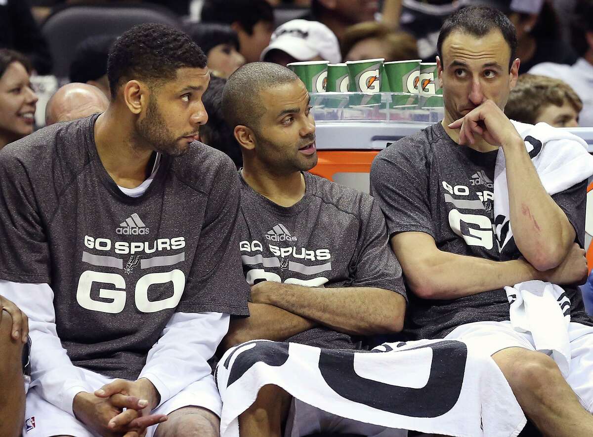 The Big Three, Tim Duncan, Tony Parker, and Manu Ginobili chat in the fourth quarter as the Spurs play the fifth game of the Western Conference Finals against the Oklahoma City Thunder on May 29, 2014.