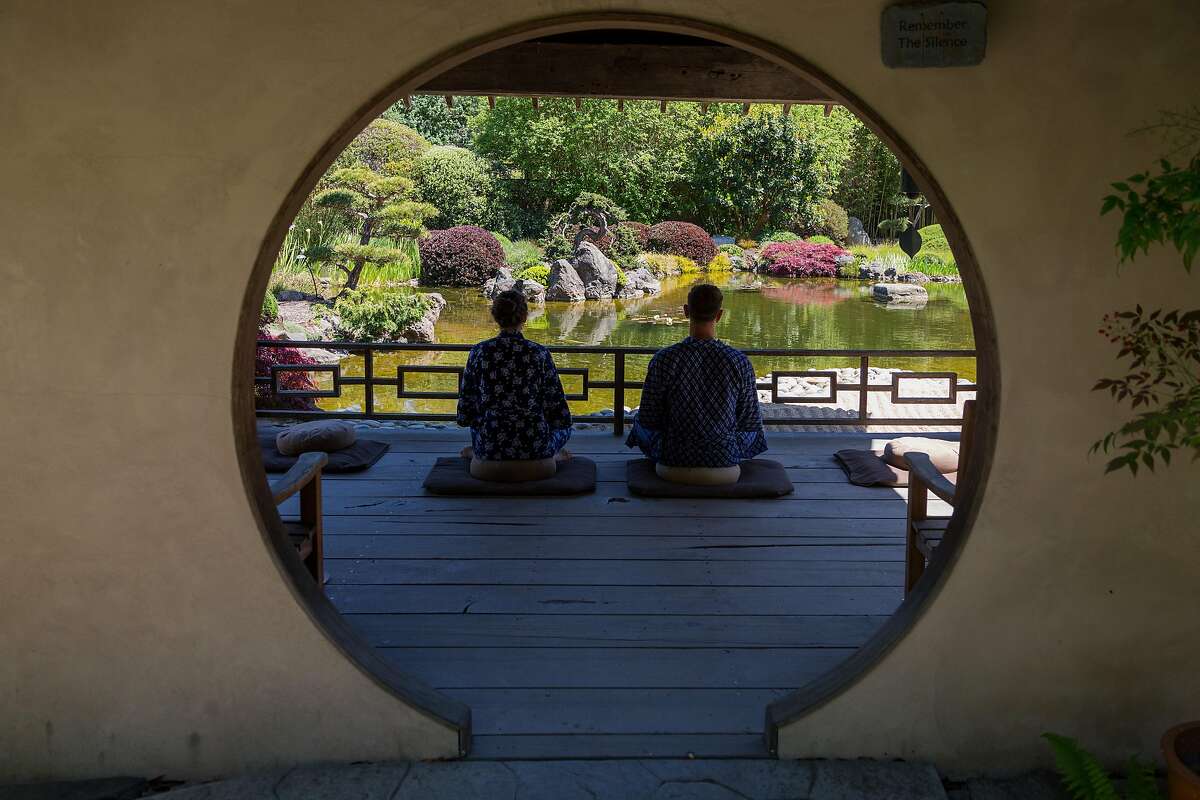 Rene� and Jason Robinson in the meditation garden at Osmosis Day Spa in Freestone, Calif., Friday, April 17, 2015. The spa serves boxed lunches from neighboring restaurant Fork.