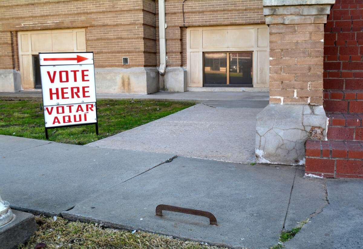 “Vote Here” signs went up Monday morning outside the basement entrances of the Hale County Courthouse with the start of early voting for the Nov. 8 General Election. Early voting runs Oct. 24-28 and Oct. 31-Nov. 4, in the courthouse basement, Abernathy City Hall, Hale Center ISD Technology Building at 1209 Ave. D and Petersburg City Hall. Election officials report a brisk start with 80 ballots cast at the courthouse during the first two hours of voting Monday. Those planning to use the north courthouse entrance need to watch their step to avoid a decades’ old relic – a blade imbedded in the sidewalk to scrape mud off your boots before entering the building.