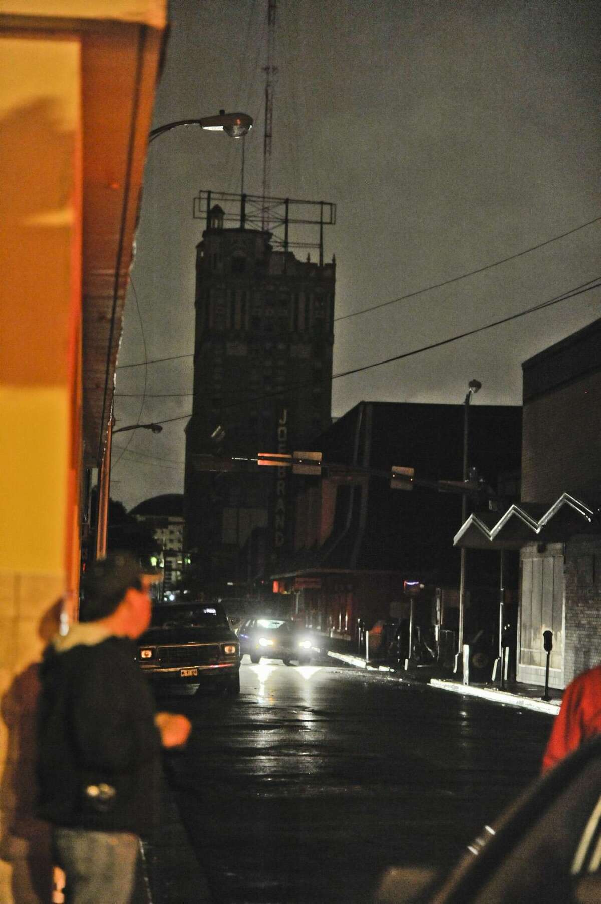The manhole fires on Convent Avenue caused a blackout for a section of downtown Laredo on Thursday evening. READ MORE: http://bit.ly/1tiIlP0 (Photo by Danny Zaragoza/Laredo Morning Times)