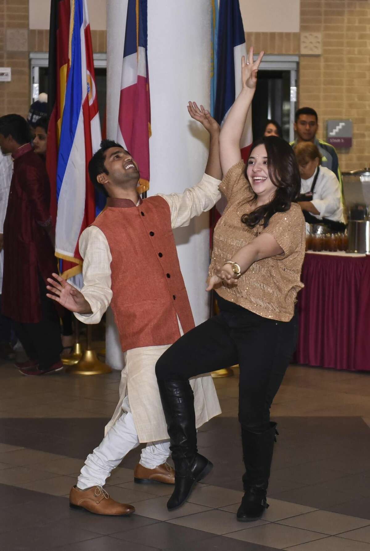 Surya Racherla and Leslie Martinez perform a dance on Tuesday evening at the TAMIU Student Center during the Diwali Festival of Lights Celebration. (Photo by Danny Zaragoza/Laredo Morning Times)