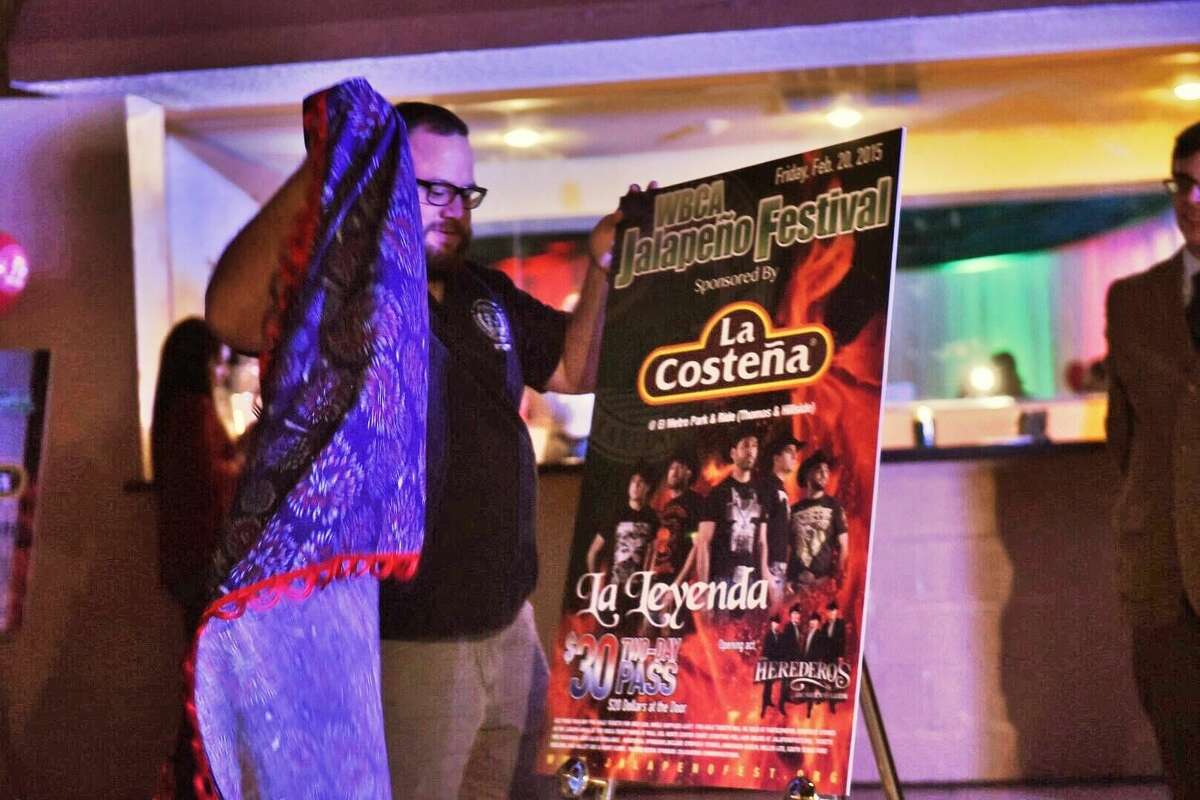 Nino Cardenas unveils a poster Monday at the Casa Blanca Ballroom, revealing the headlining act La Leyenda for the 2015 Jalapeño Festival. Read the full story in Tuesday's newspaper and e-edition. (Photo by Danny Zaragoza/Laredo Morning Times)