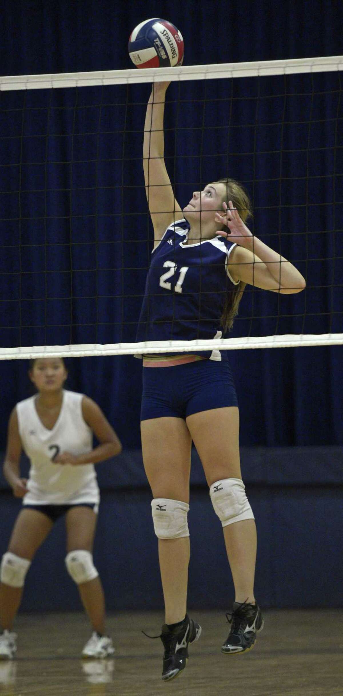 FILE PHOTO: Immaculate's Rachel Hewitt (21) goes up for the spike in the girls high school volleyball match between Henry Abbott Technical and Immaculate high school on Wednesday afternoon, September 23, 2015, at Immaculate High School, in Danbury, Conn.