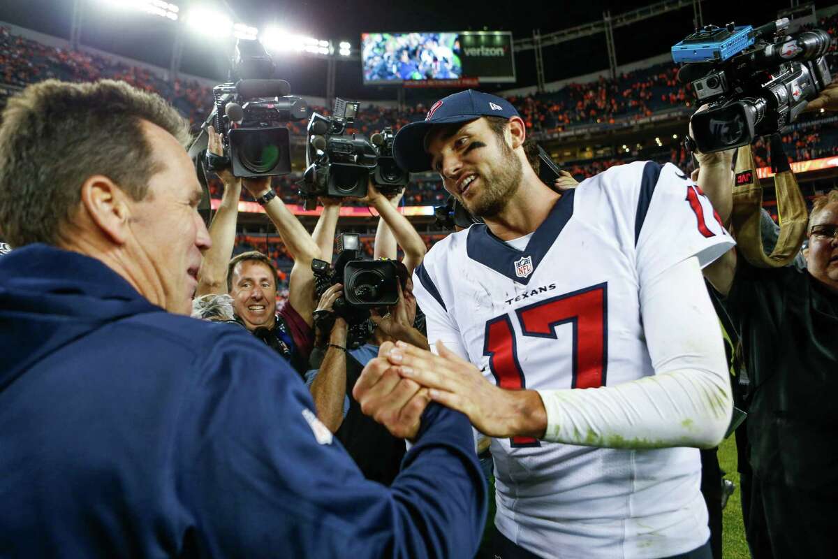 Denver Broncos head coach Gary Kubiak shakes hands with his former player, Houston Texans quarterback Brock Osweiler (17), after an NFL football game at Sports Authority Field at Mile High on Monday, Oct. 24, 2016, in Denver. ( Brett Coomer / Houston Chronicle )