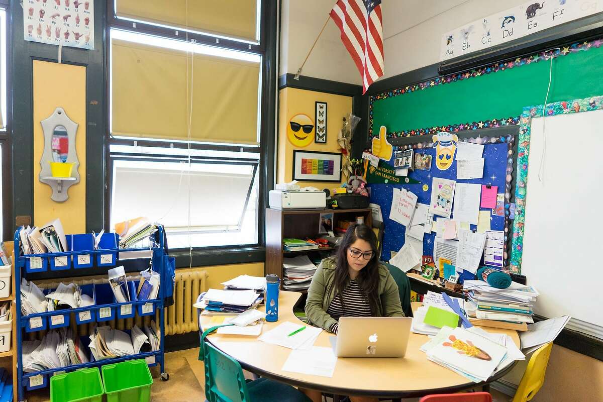 Second grade teacher Johanna Roldan prepares for class at Leonard R. Flynn Elementary School in San Francisco, Calif. on Tuesday, Oct. 25, 2016. Roldan was a recent victim of an eviction. SFUSD district officials as well as other city representatives are launching new support services to help teachers live in the city