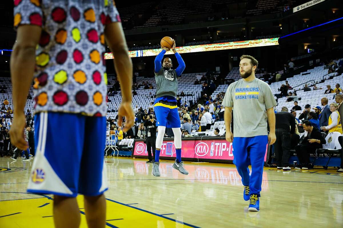 Warriors forward Kevin Durant, #35, warms up ahead of a game between the Warriors vs. the Spurs, at Oracle Arena, in Oakland, California, on Tuesday, Oct. 25, 2016.