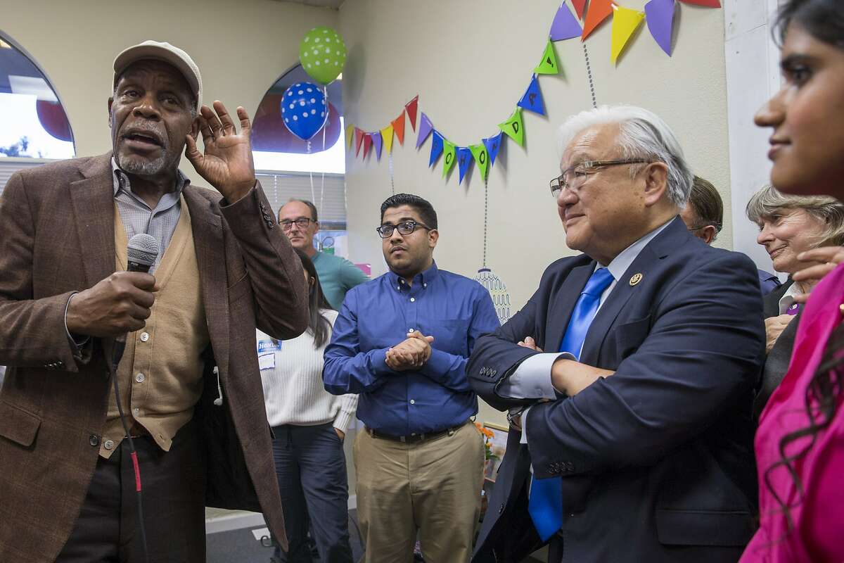 From left: Danny Glover, Vedant Patel (in blue shirt), Rep. Mike Honda, D-Calif., and Tara Sreekrishnan, who is the regional field director for Honda, (in pink) during a get-out-the-vote rally at Honda's campaign headquarters, on Tuesday, Oct. 25, 2016 in Cupertino, Calif.
