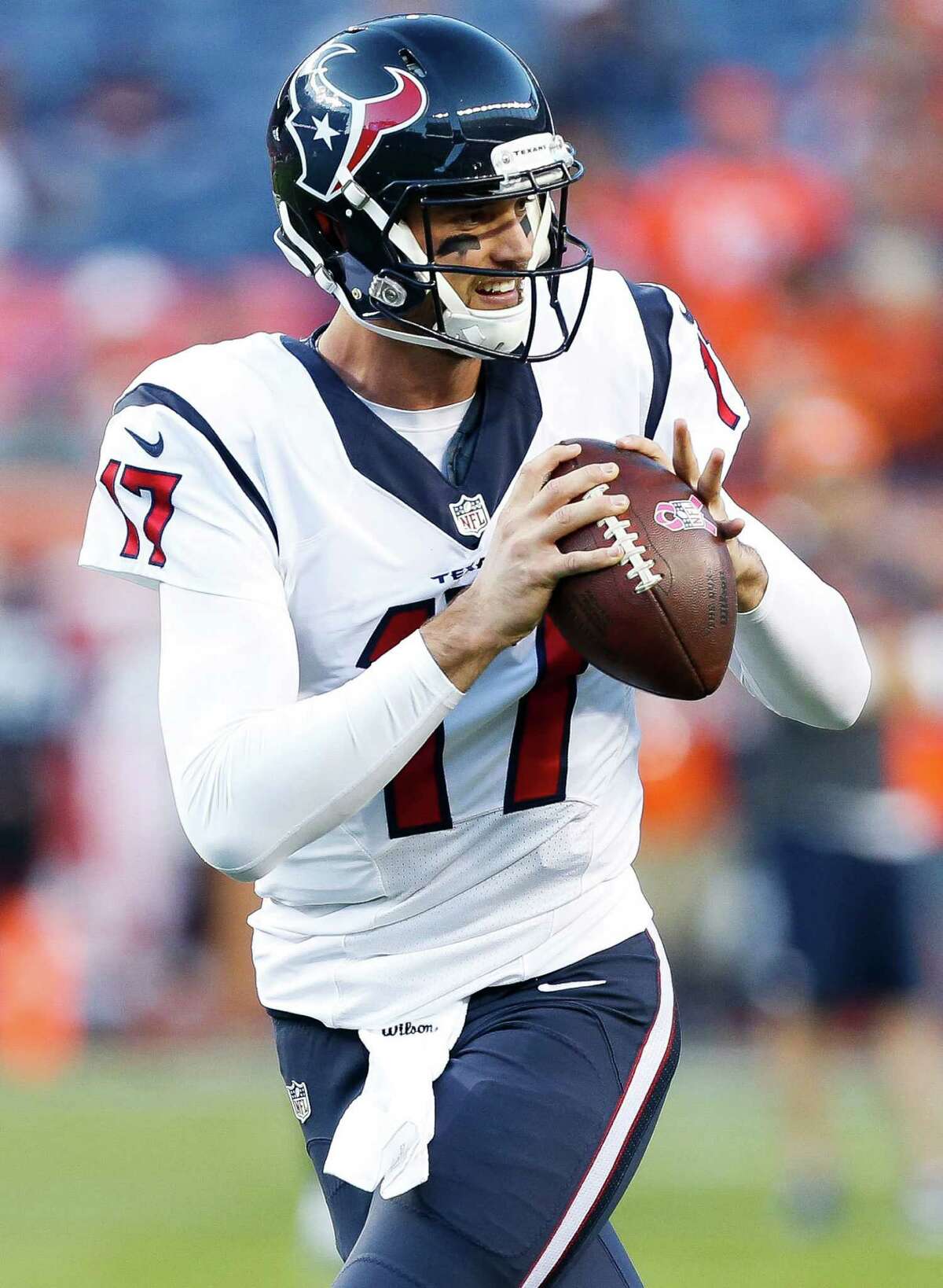 Houston Texans quarterback Brock Osweiler (17) makes a pass before an NFL football game at Sports Authority Field at Mile High on Monday, Oct. 24, 2016, in Denver.