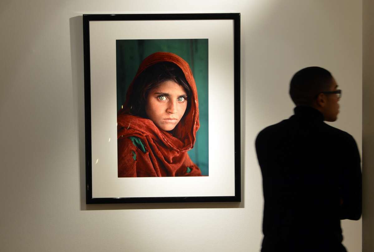 "Afghan Girl, 1984" by photographer Steve McCurry (estimate- USD $30,000 to $50,000) on display as part of "The National Geographic Collection: The Art of Exploration" at Christie's November 30, 2012 in New York. Fine art from the archives of the National Geographic Society will be auctioned on December 6.