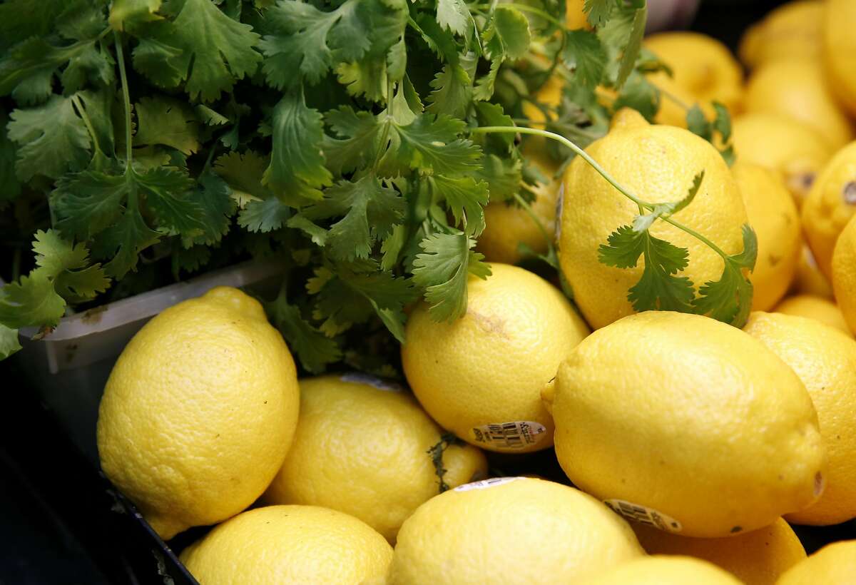Cilantro and lemons are sold in the produce section at Palou Market on Third Street in San Francisco, Calif. on Wednesday, Oct. 26, 2016. Palou Market is one of the first corner stores to participate in the Healthy Retail SF program, which offers incentives to sell produce and other healthy food alternatives.