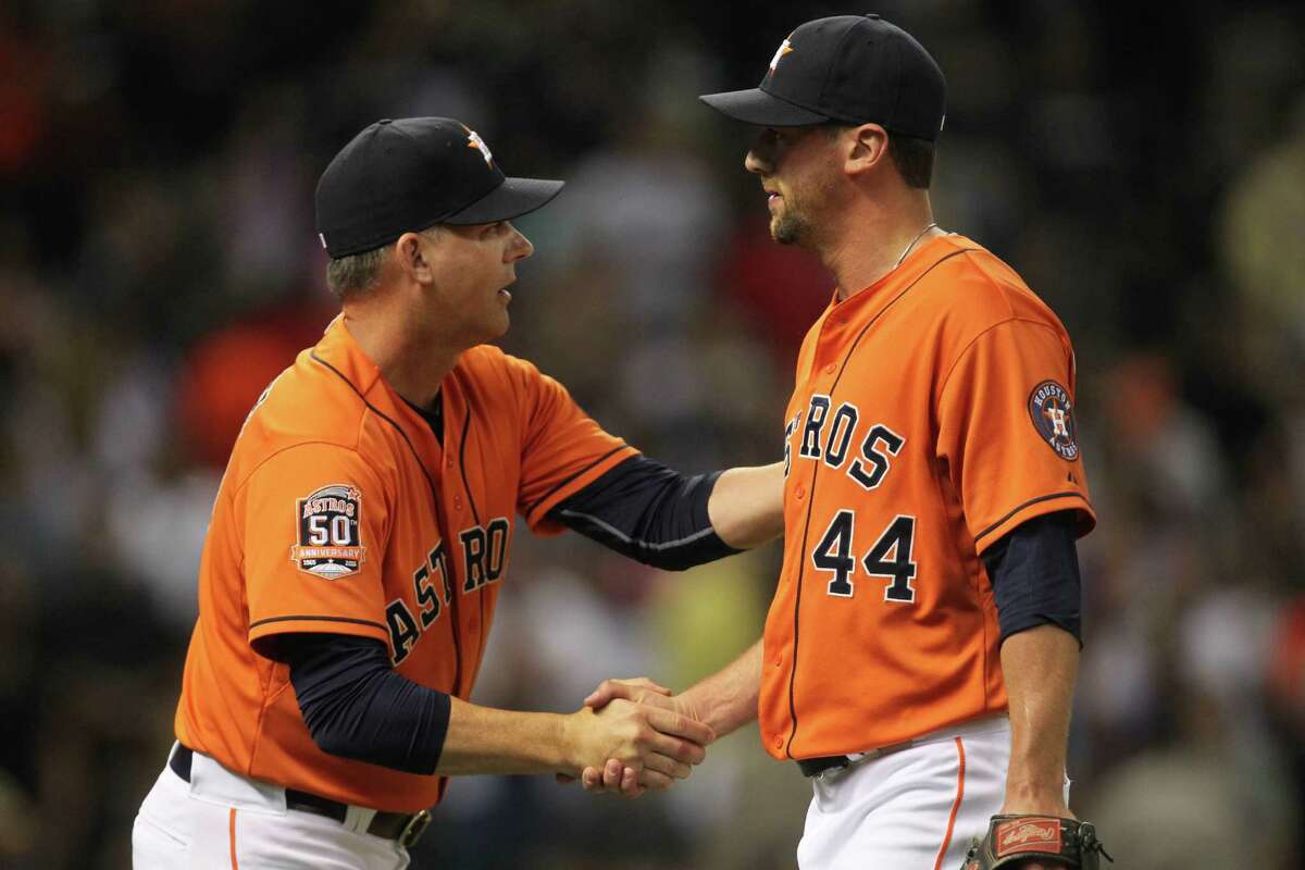 Astros manager A.J. Hinch, left, tabbed three different relievers, including Luke Gregerson, with the closer job at various times during the 2016 season.