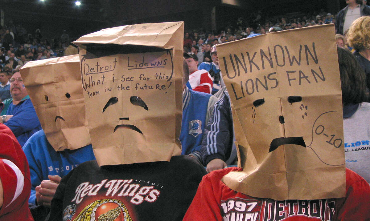 A Detroit Lions fan wears a bag during the fourth quarter of an NFL  football game against the Chicago Bears at Ford Field in Detroit, Sunday,  Dec. 5, 2010. (AP Photo/Carlos Osorio