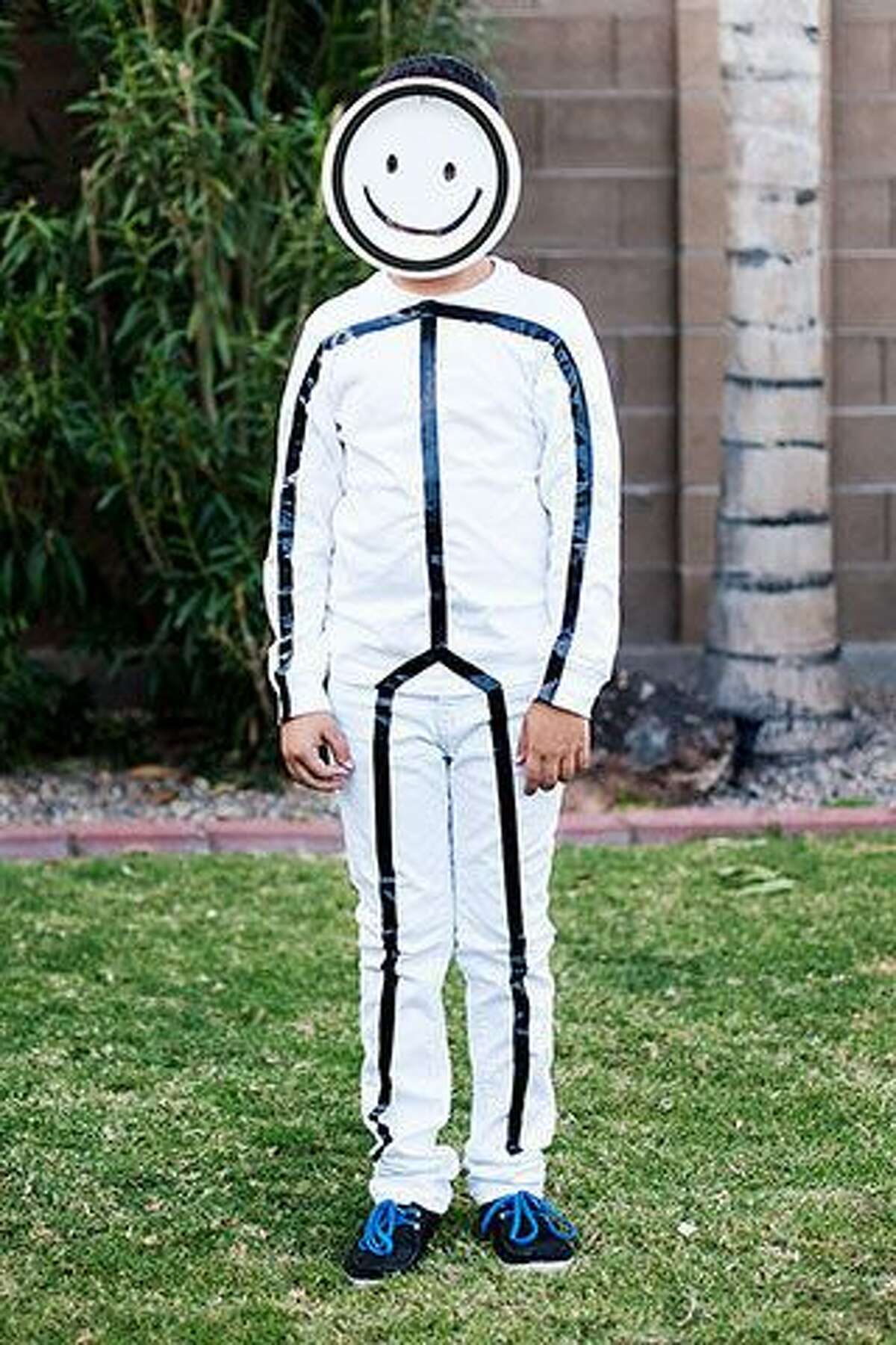 Stick Figure What you'll need:- White clothes- Electrical tape Photo: Pinterest