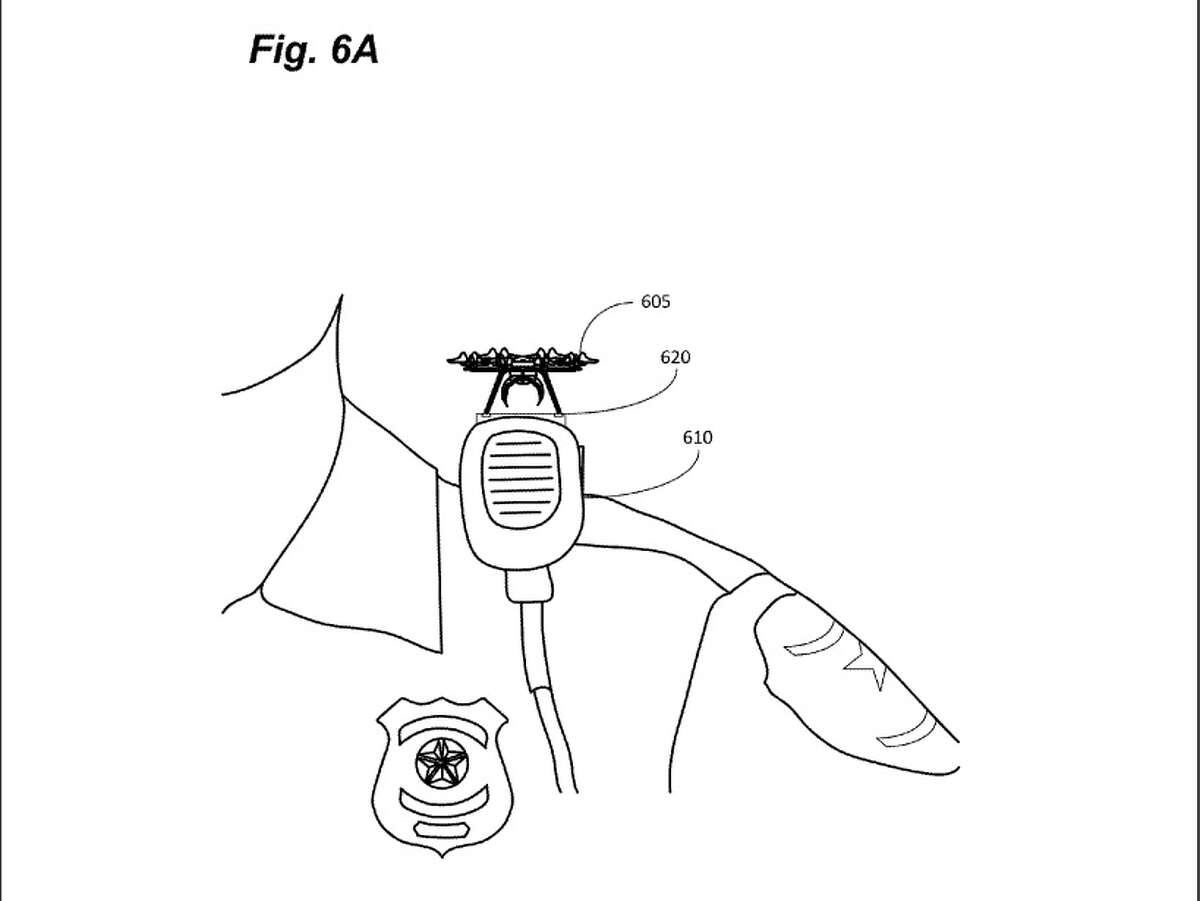 The tiny drone, at least in this drawing, could be just as wide as an officer's radio microphone, and dock on their shoulder. Amazon Technologies was granted a patent for the device last week.