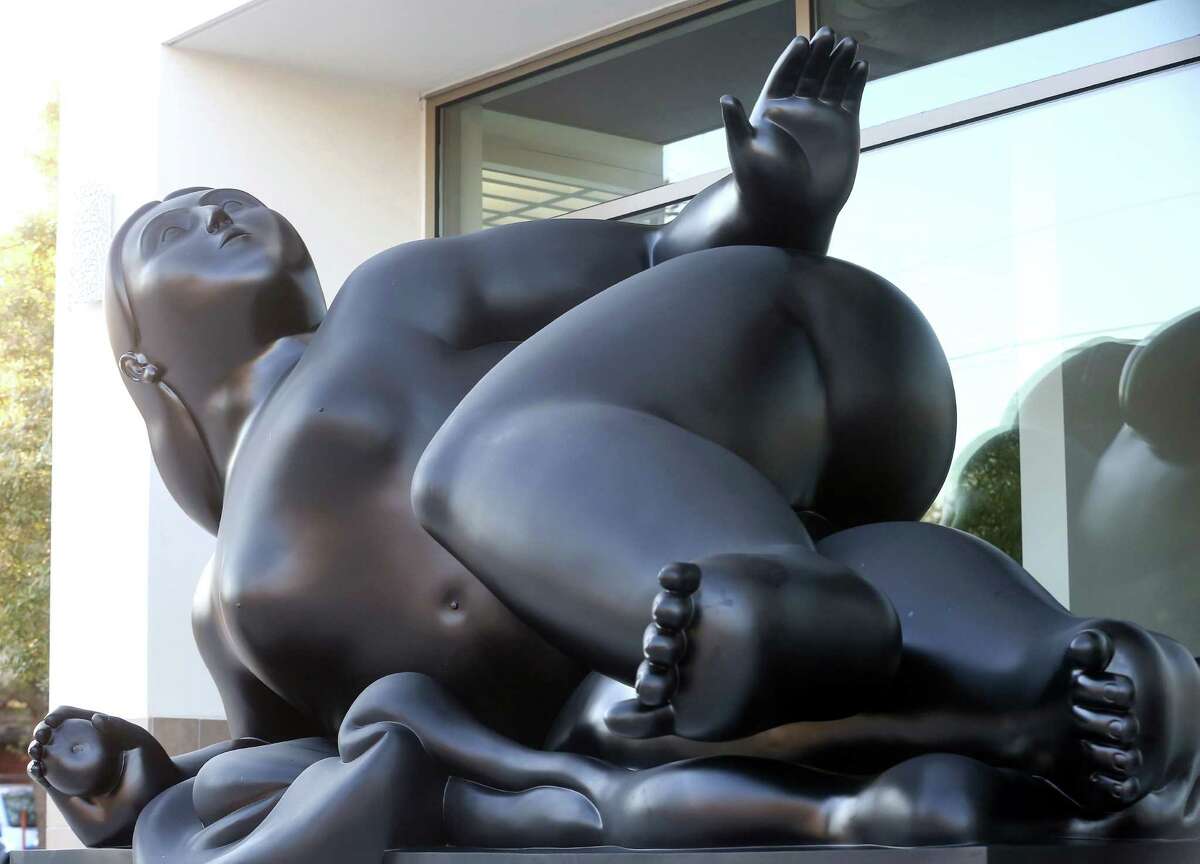 A sculpture by Fernando Botero is seen in front of Art of the World Gallery, Thursday, Oct. 27, 2016, in Houston.
