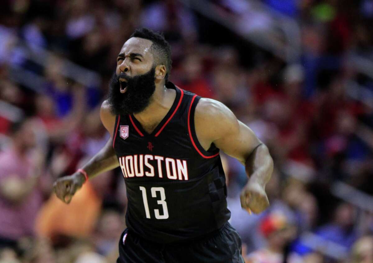 Houston Rockets guard James Harden (13) celebrates a three-pointer during the Houston Rockets game against the Dallas Mavericks at the Toyota Center, Sunday, Oct. 30, 2016, in Houston.
