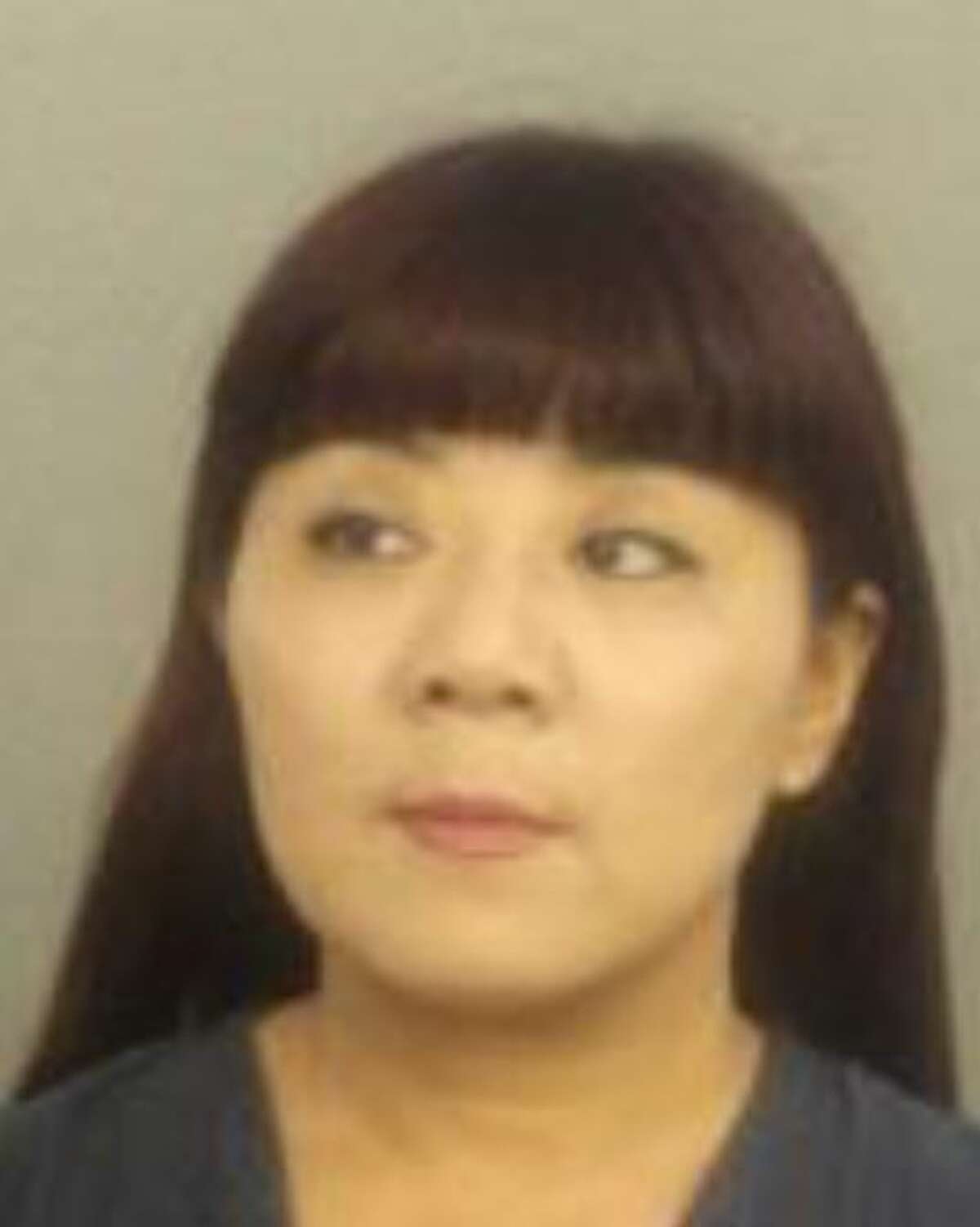 The Hollywood Police Department in Hollywood, Florida arrested Roulan Zhu for soliciting for prostitution, practicing without a license and misrepresenting herself as a licensed masseur at Asian Massage.