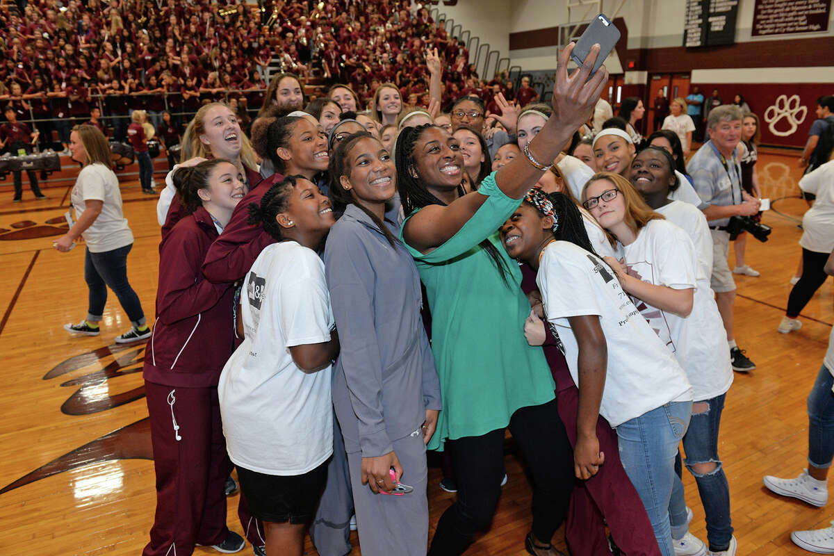 Nneka Ogwumike takes a selfie with Cy-Fair students and athletes at her welcome home pep rally on Oct. 28.