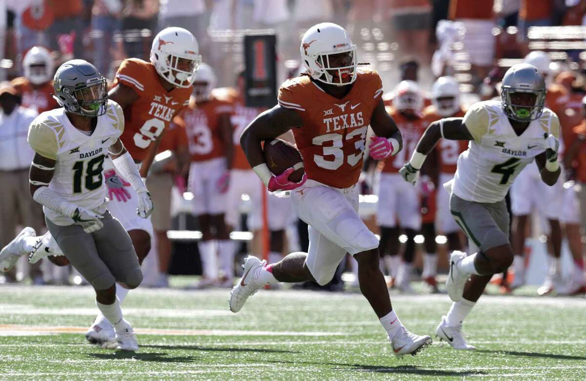 Texas running back D'Onta Foreman (33) runs for a 37- yard touchdown against Baylor during the first half on a NCAA college football game, Saturday, Oct. 29, 2016, in Austin, Texas. (AP Photo/Eric Gay)