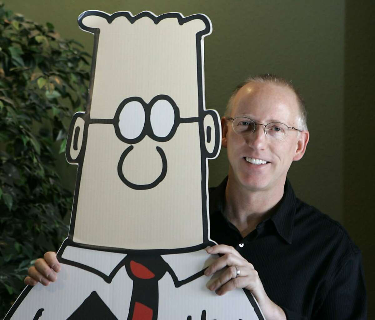 Scott Adams, creator of the comic strip Dilbert, poses for a portrait with the Dilbert character in his studio in Dublin, Calif., Thursday, Oct. 26, 2006. 