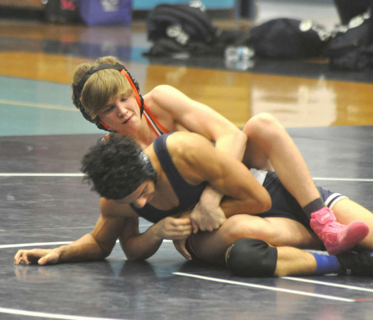 Tiger Haydon Grammer has control in his 132-pound match with Latrell Hardison of the Lancers. EHS won the dual 59-6.