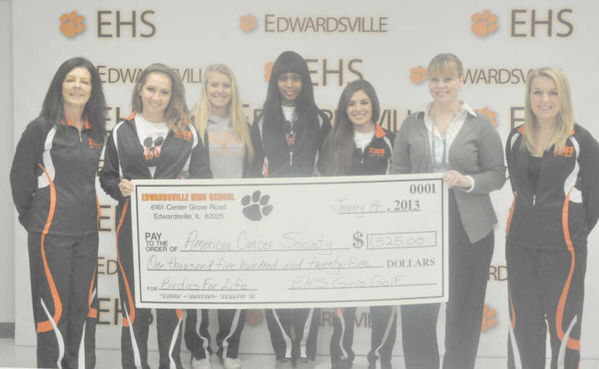 The Edwardsville Tiger girls’ golf team donated $1,525 to the American Cancer Society as part of the Birdies For Life program. The program, started by junior golfer Emilee Flaugher, raised money for each birdie the Tigers made this season. Flaugher presents the check to American Cancer Society representative Michael Hitt. In the back row from left to right are: EHS golf coach Tresa LaBoube, Lauran Bellling, Ashlea Hearn, Taylor Maggio and Austin Gordon. 