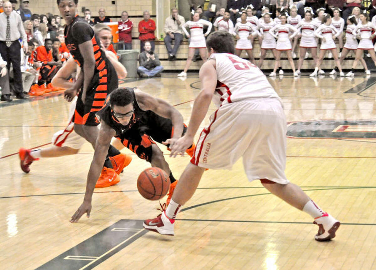 EHS’ Shawn Roundtree attempts to recollect himself after being tripped going through the lane.