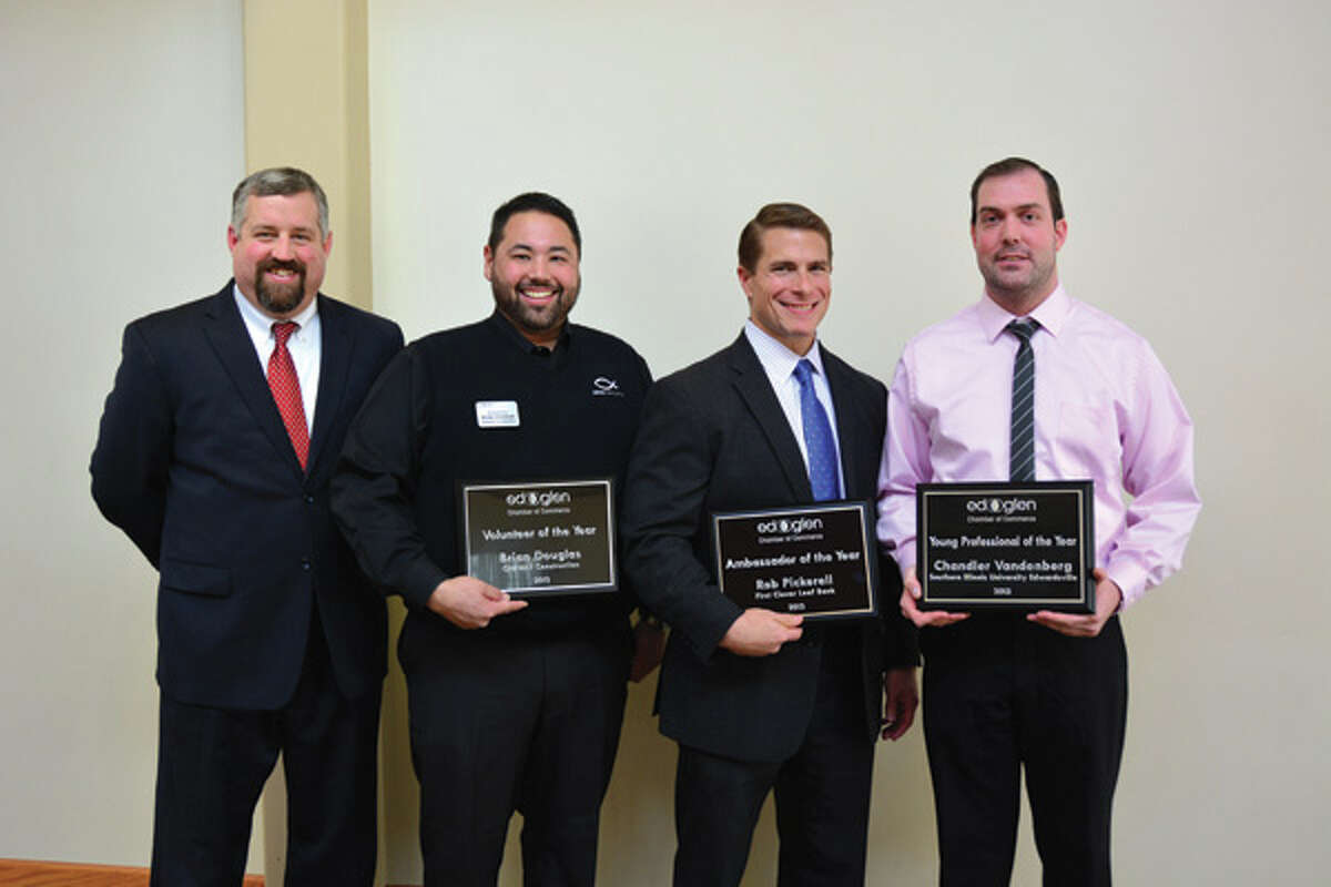 From left are: Paul Millard, 2013 board chairman, vice president of the commercial banking group at TheBANK of Edwardsville; Brian Douglas, Volunteer of the Year award, works for ONEWAY Construction; Rob Pickerell, Ambassador of the Year award, works for First Clover Leaf Bank and Chandler Vandenberg, Young Professional of the Year award, works for SIUE.