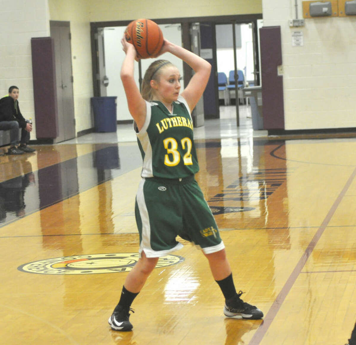 MELHS’ Abby Yurchuk prepares to send a pass into the paint against the Greyhounds on Thursday.
